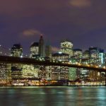New York City Manhattan and Brooklyn Bridge at dusk