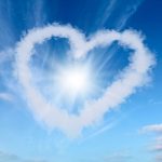 Love heart from clouds on blue sky